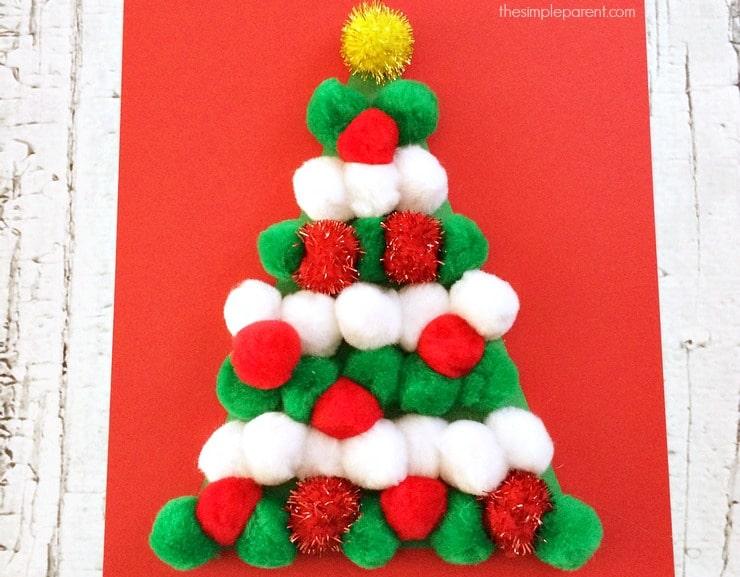 pom pom christmas tree with green red white and yellow pom poms